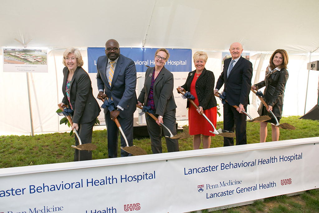 Representatives holding shovels at the Lancaster Behaviroal Health Hospital ground breaking ceremony